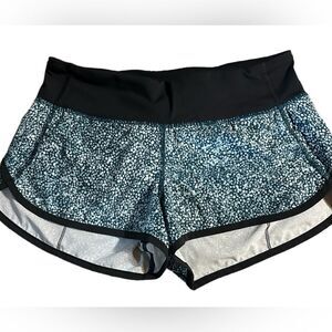 Lululemon size 4 blue/black Athletica speed short. Pre loved in great condition